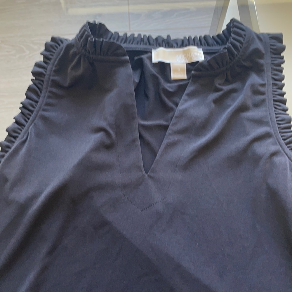 Black sleeveless shirt